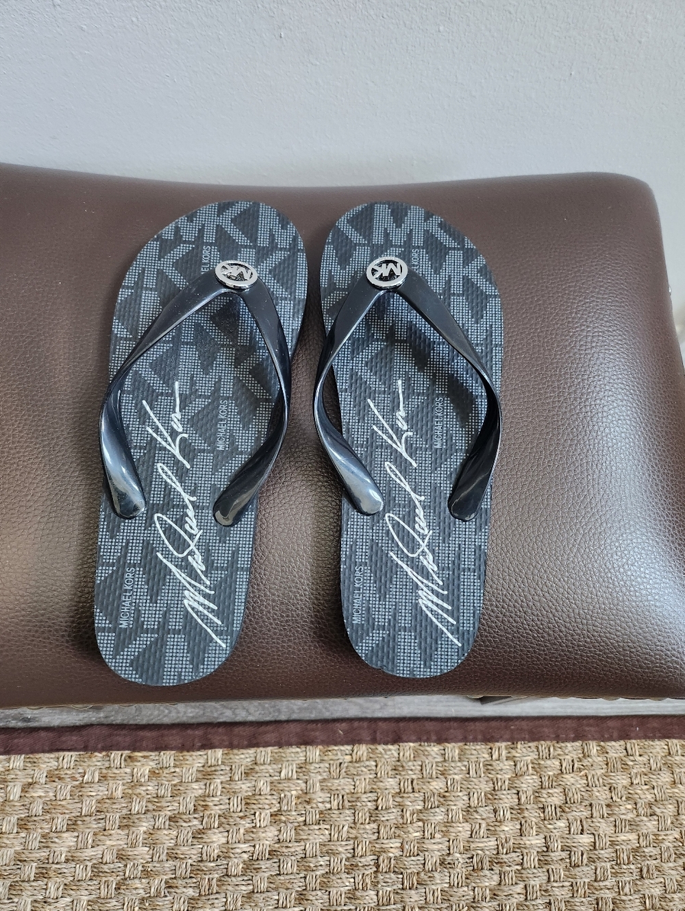 Michael Kors Black Logo-Print Men’s Flip Flops with Silver MK Emblems